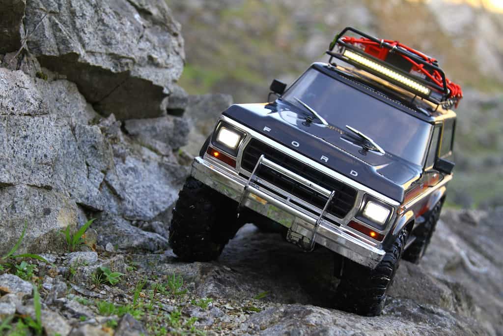 ford bronco rc crawler on a rocky hill side
